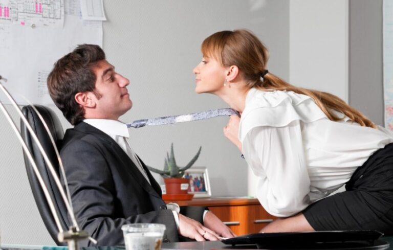 sexual act on a desk in an office